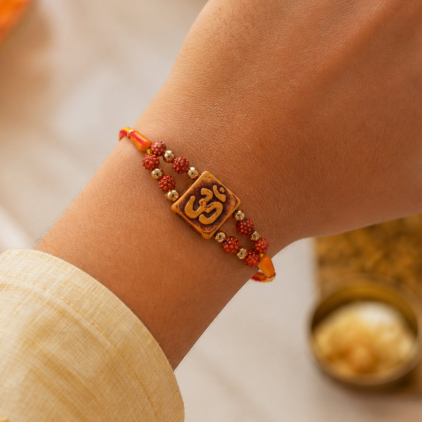 Square Om Engraved Rudraksha Golden Beads Traditional Rakhi
