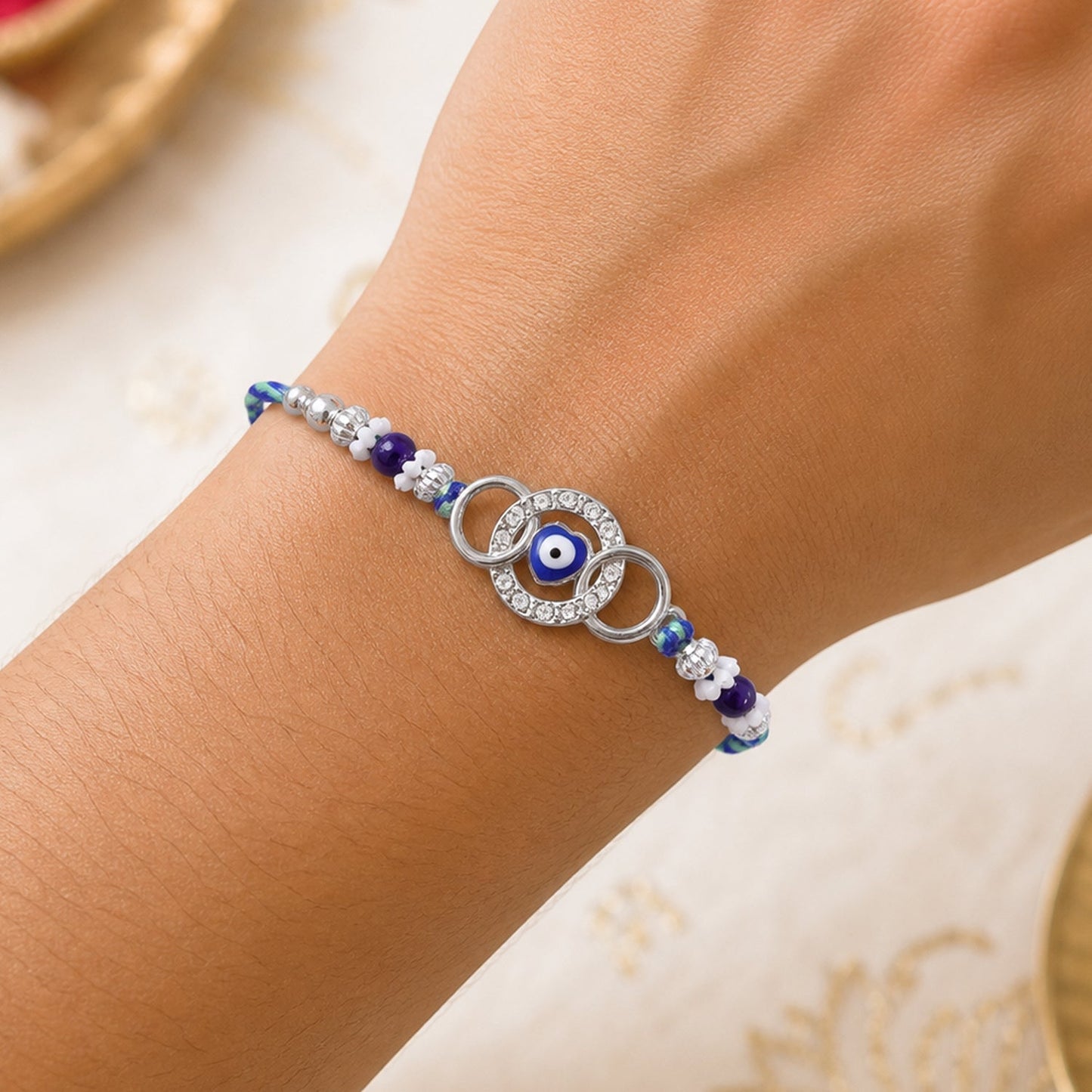 Stylish Round Ring Nazar Evil Eye Crystal Floral Beads Rakhi