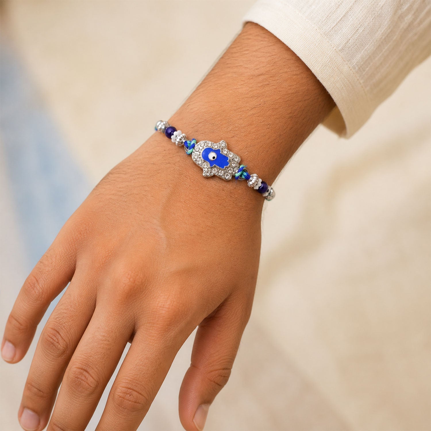Designer Evil Eye Charm Rakhi with Studded Beads 