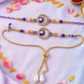 Premium Evil Eye Bhai Bhabhi Lumba Rakhi Set with Pearl Tassel Chain