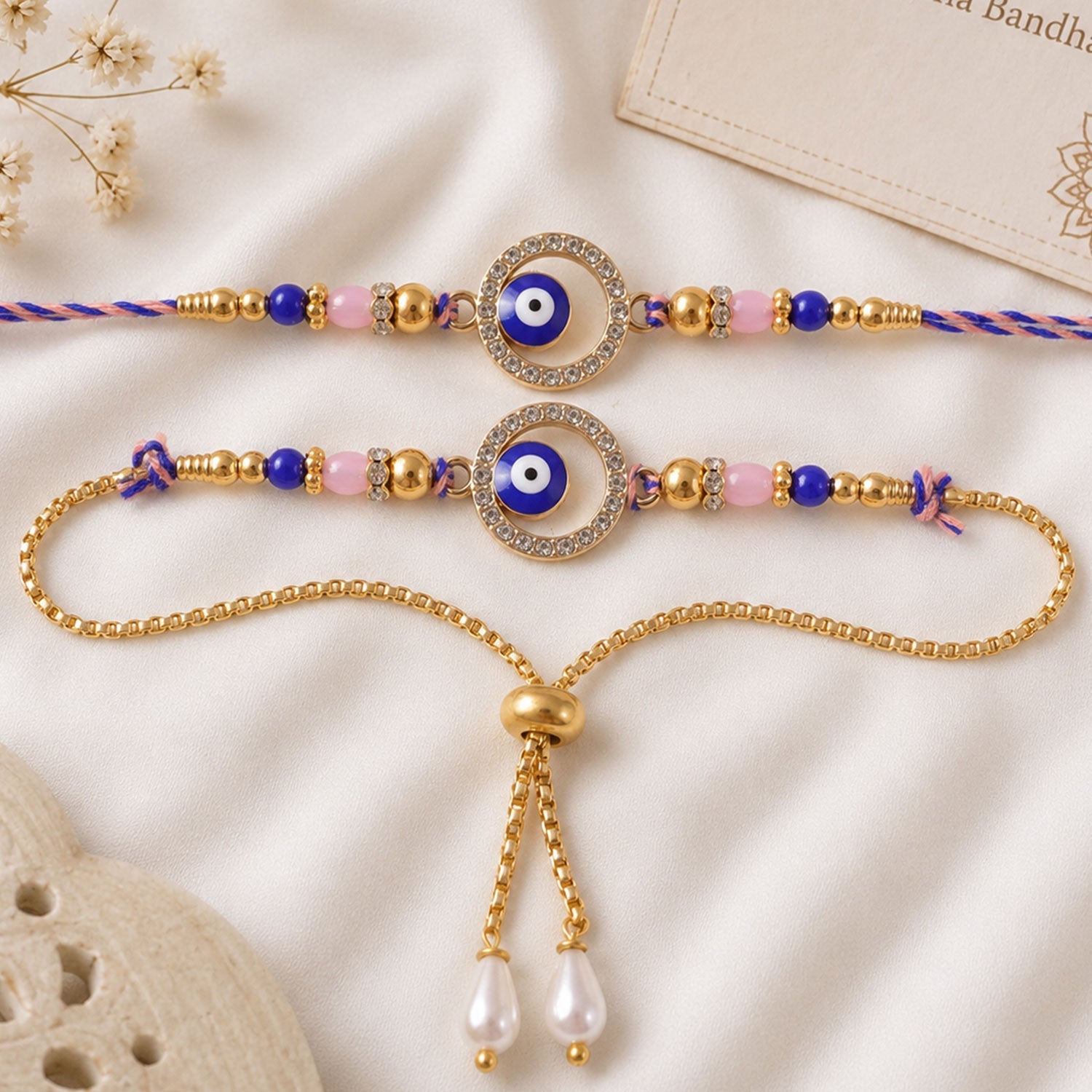 Premium Evil Eye Bhai Bhabhi Lumba Rakhi Set with Pearl Tassel Chain