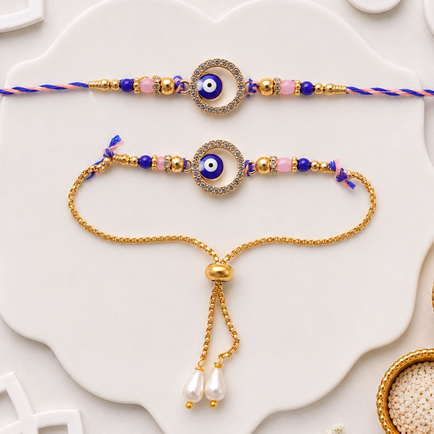 Premium Evil Eye Bhai Bhabhi Lumba Rakhi Set with Pearl Tassel Chain