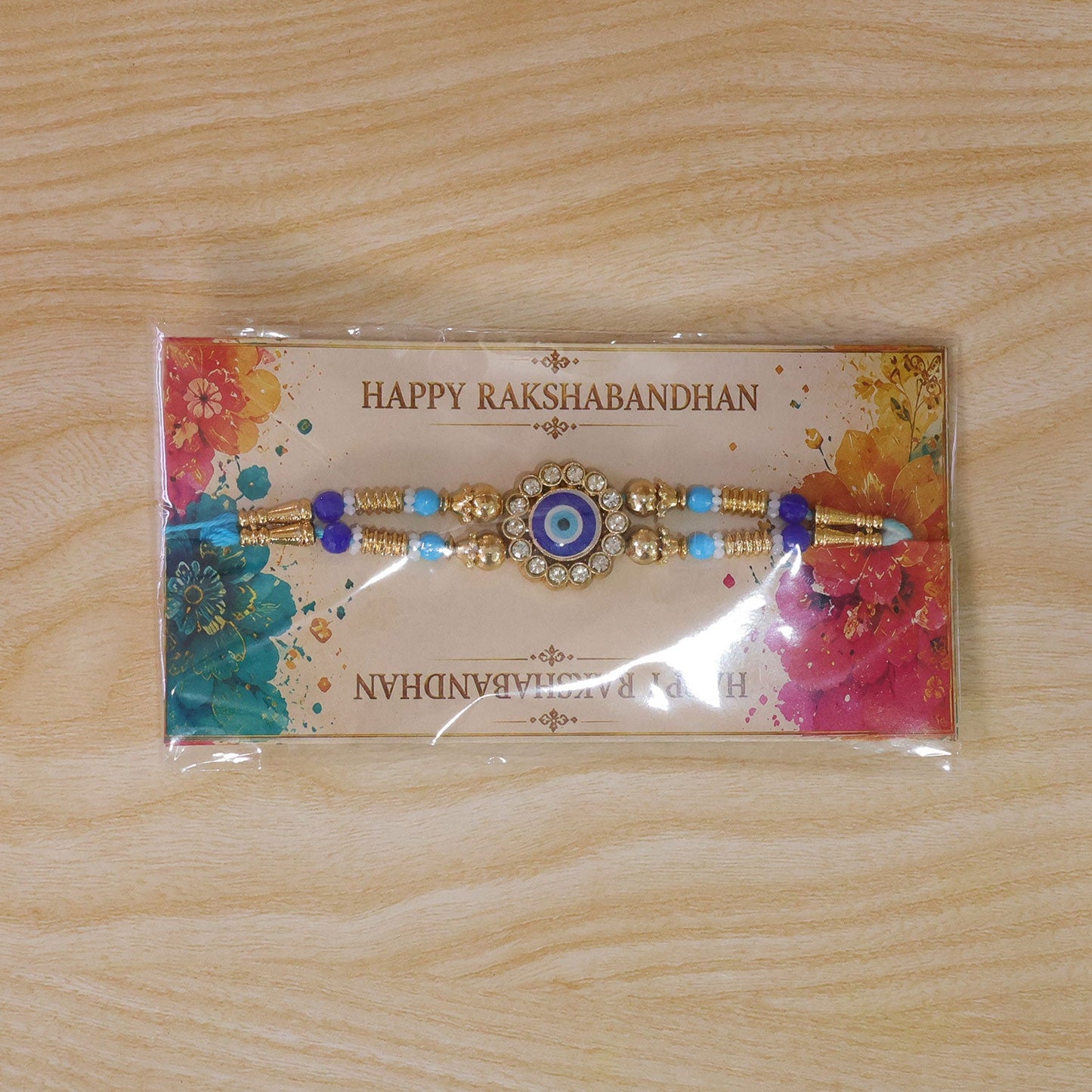 Round Evil Eye Kundan Rakhi with Pearl Beads and Ornate Center Design