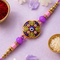 Round Evil Eye Mandala Stone Rakhi with Pearl Beads and Festive Center Charm
