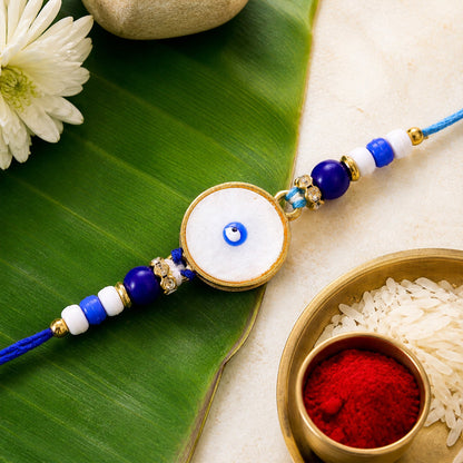 Classic Evil Eye Rakhi with Pearl Beads and Smooth Round Center Detail