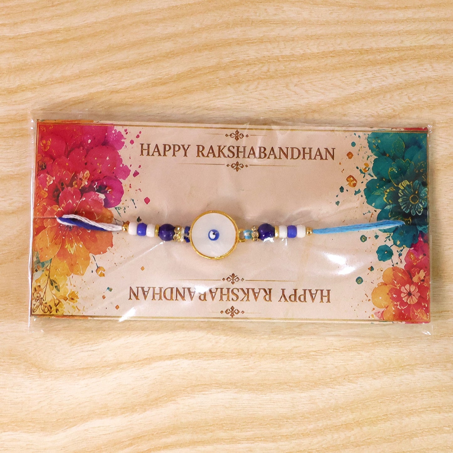 Classic Evil Eye Rakhi with Pearl Beads and Smooth Round Center Detail
