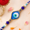 Stylish Evil Eye Rakhi with Beaded String and Protective Center Charm