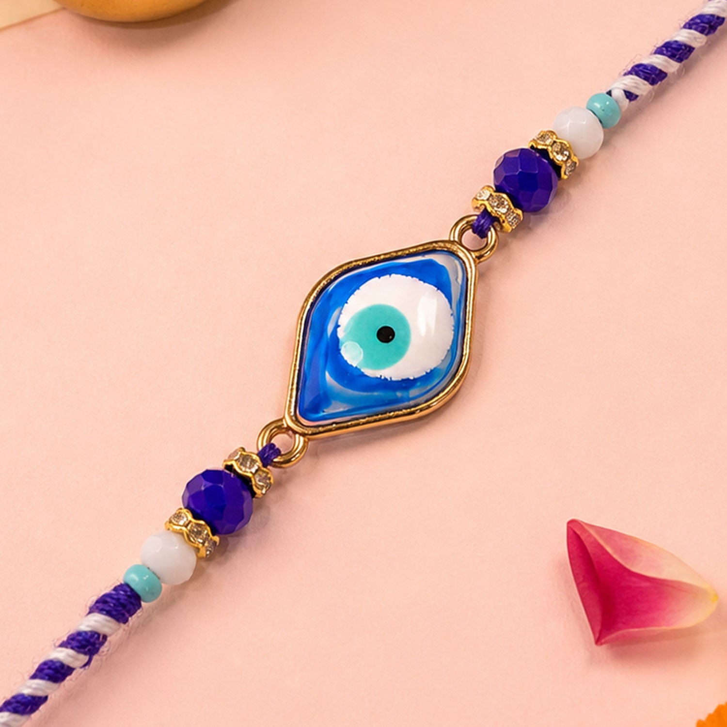 Stylish Evil Eye Rakhi with Beaded String and Protective Center Charm