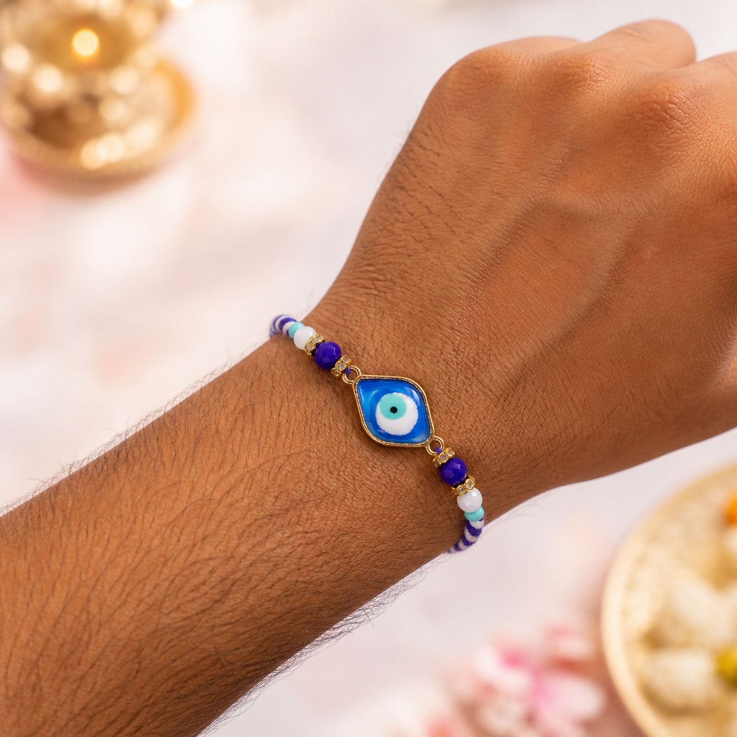 Stylish Evil Eye Rakhi with Beaded String and Protective Center Charm