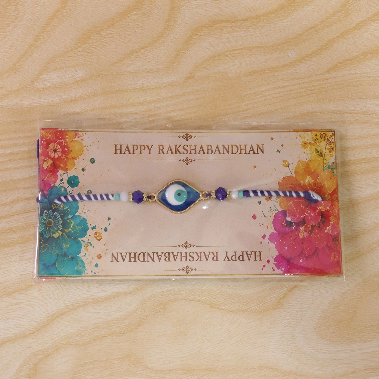 Stylish Evil Eye Rakhi with Beaded String and Protective Center Charm