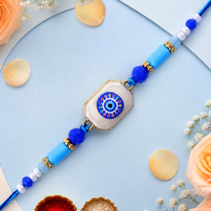 Round Nazar Stone Rakhi with Beaded String and Traditional Center Detail