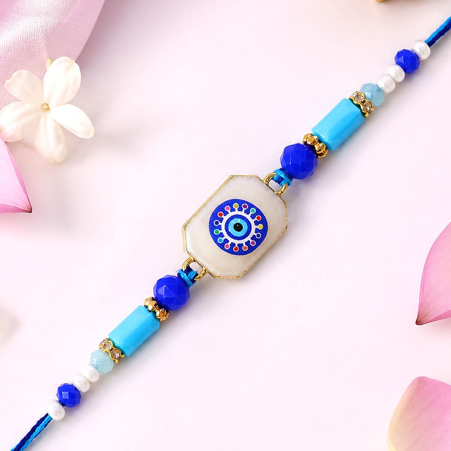 Round Nazar Stone Rakhi with Beaded String and Traditional Center Detail