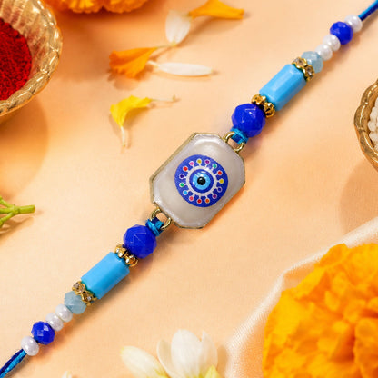 Round Nazar Stone Rakhi with Beaded String and Traditional Center Detail