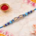 Infinity Evil Eye Stone Beaded Rakhi with Elegant Link Center Detail Design