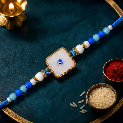 Square Evil Eye Rakhi with Pearl Beads and Simple Center Charm Design