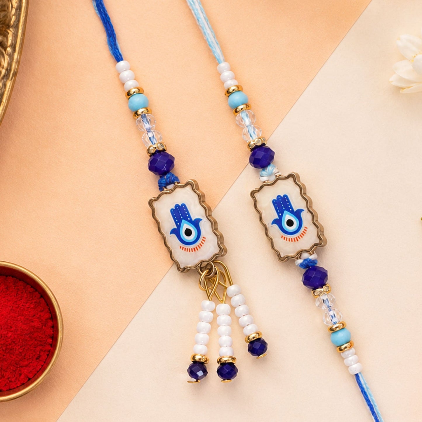 Premium Evil Eye Bhai Bhabhi Lumba Rakhi Pair with Hanging Beads and Stone Center Detail