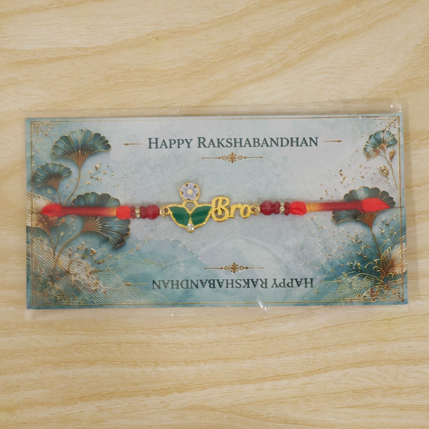 BRO Letter Pearl Beaded Rakhi with Floral Accent Center Design