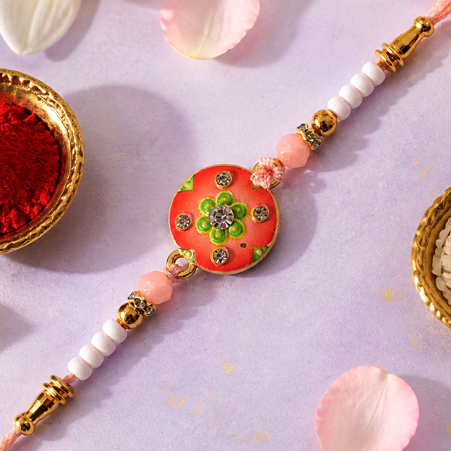 Floral Stone Beaded Rakhi with Pearl Accent and Round Center Design