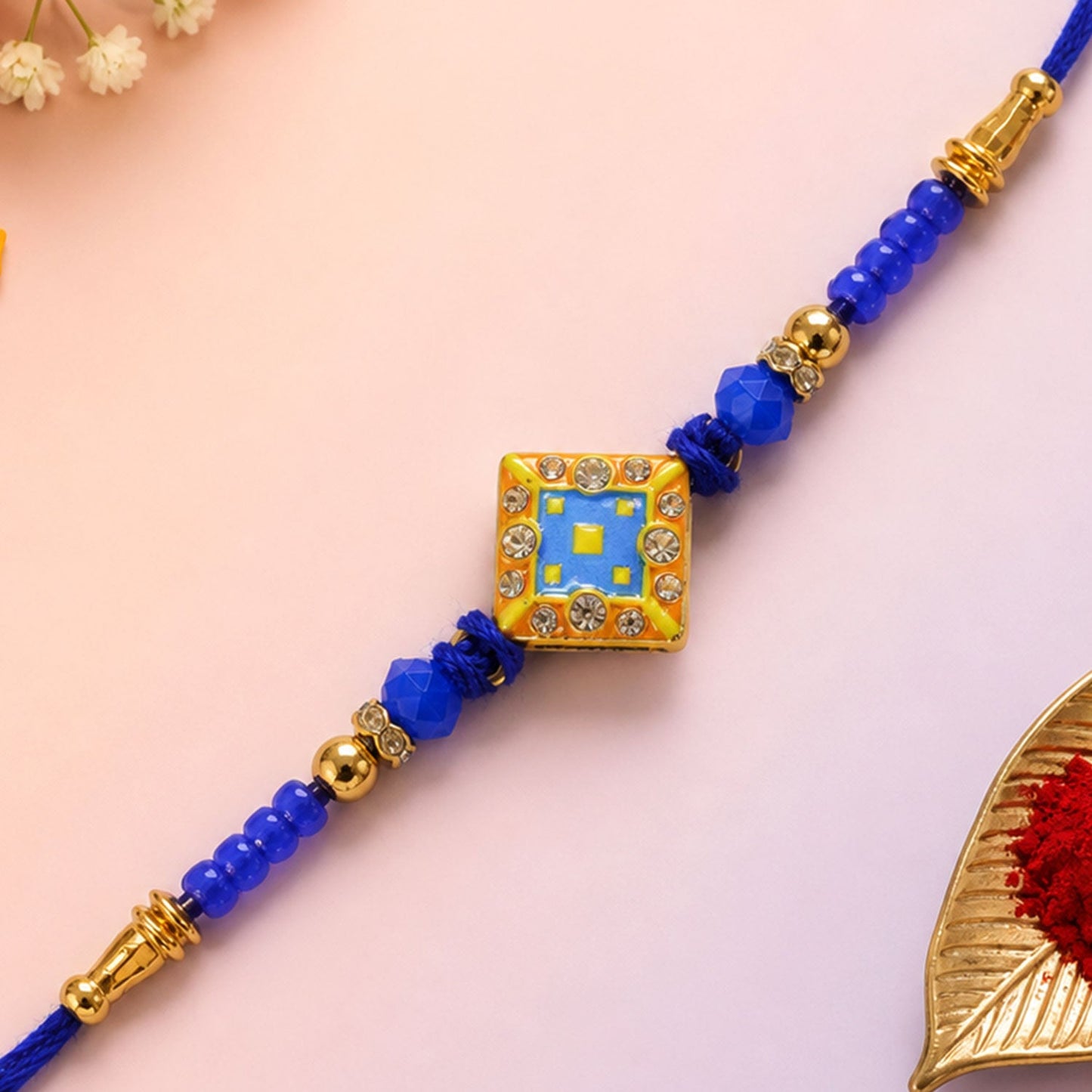 Square Kundan Stone Rakhi with Beaded String and Center Charm Detail