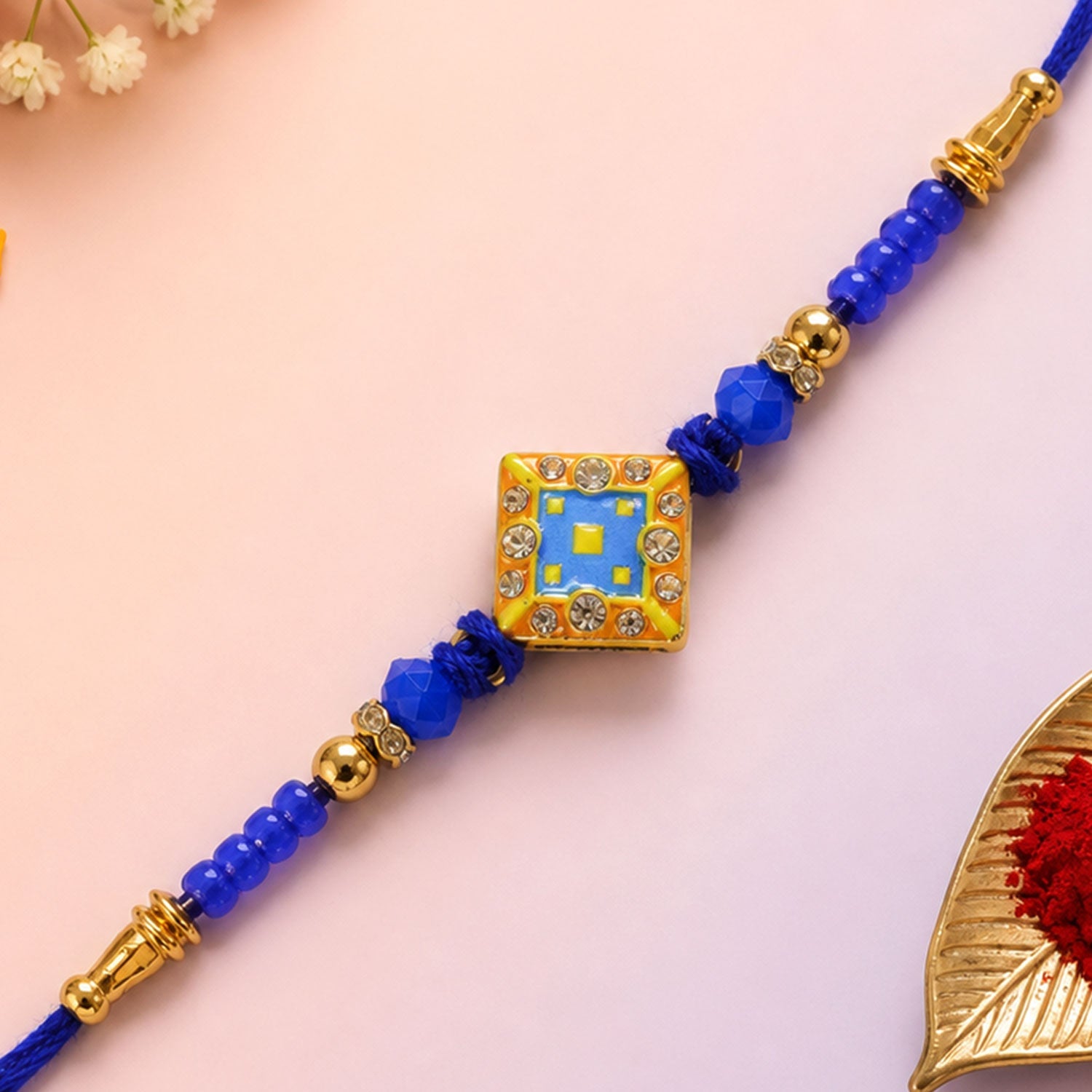 Square Kundan Stone Rakhi with Beaded String and Center Charm Detail