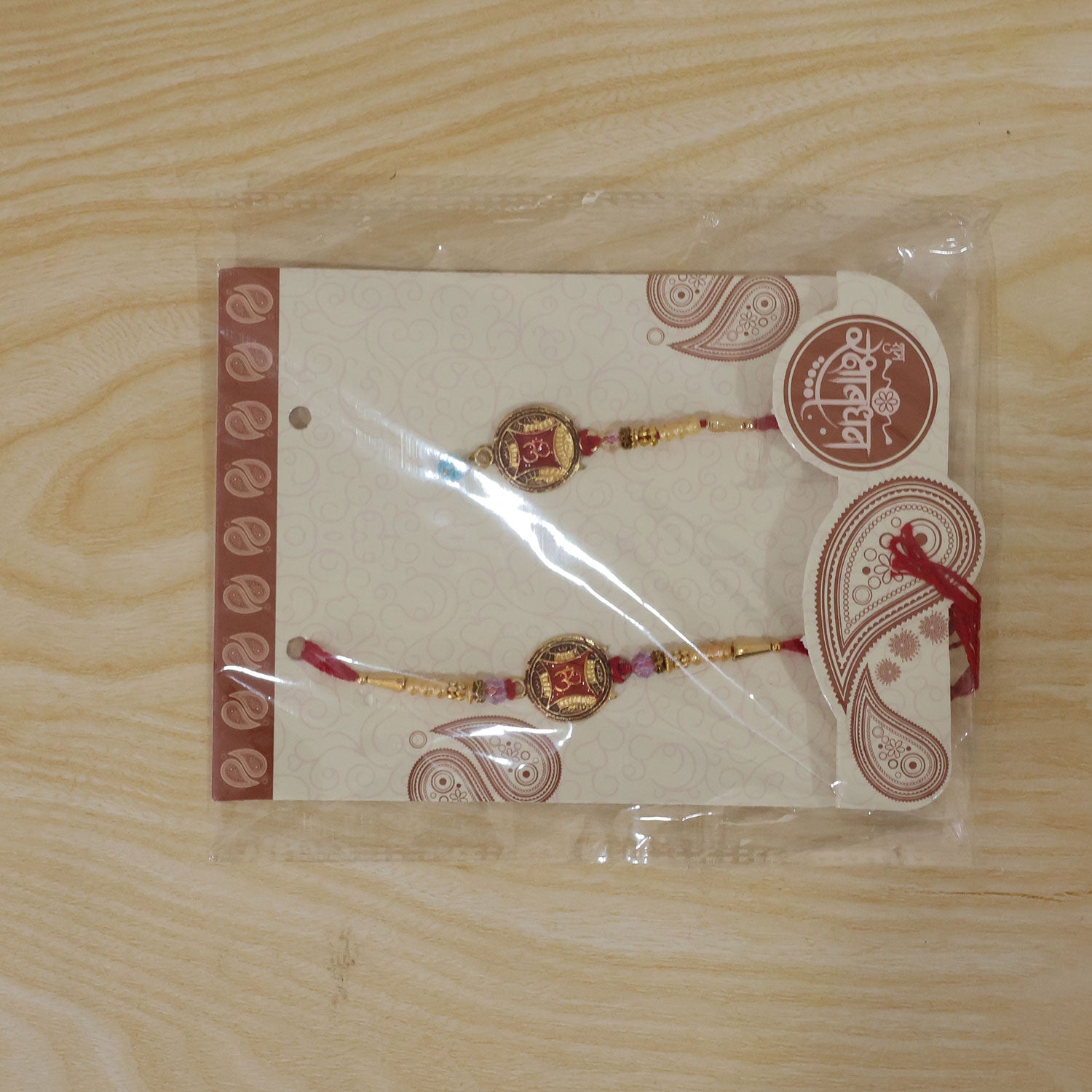 Round Om Red Enamel Golden Pearl Beads Premium Bhai Bhai Rakhi Set