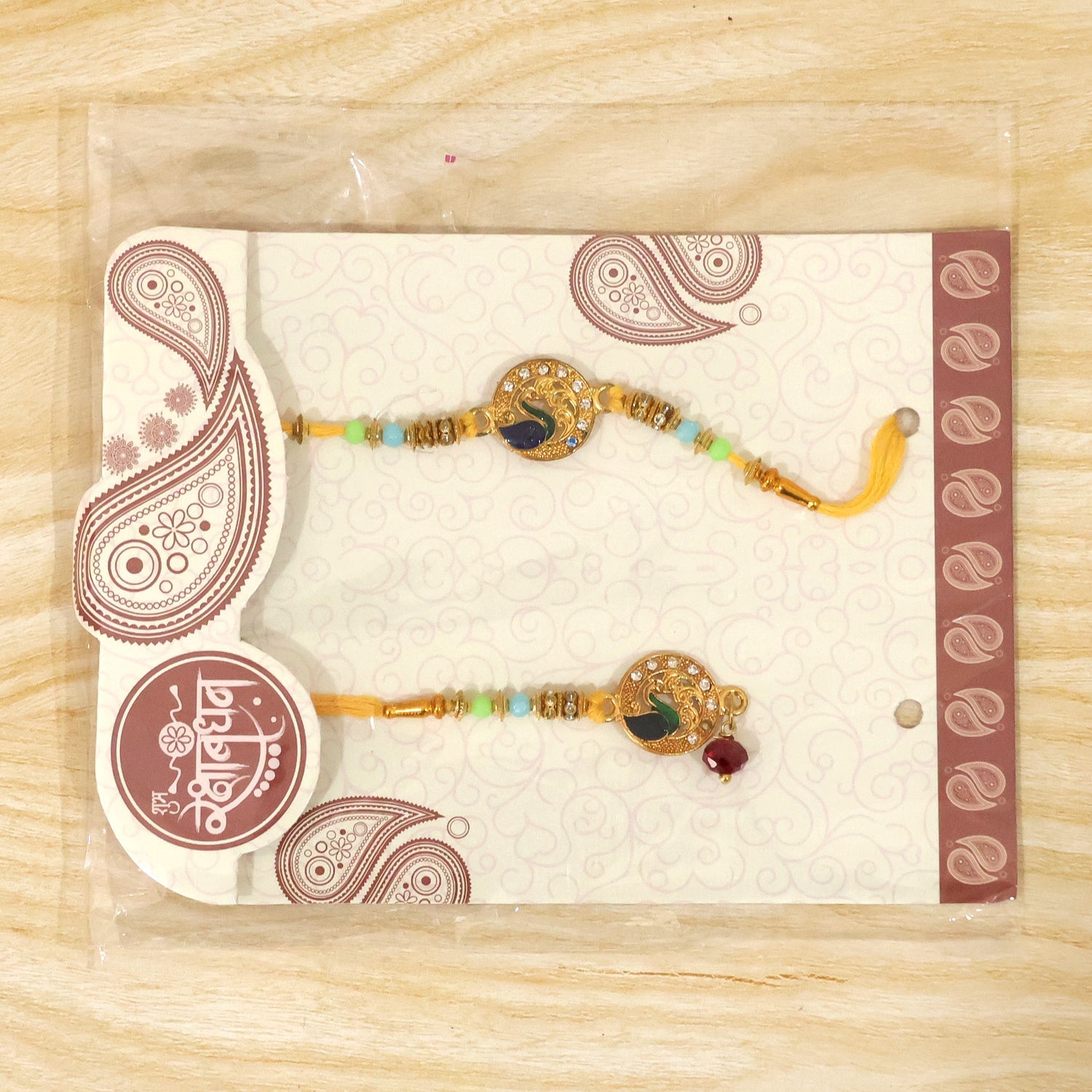 Premium Paisley Peacock Charm Bhai Bhabhi Lumba Rakhi with Pearl Drop