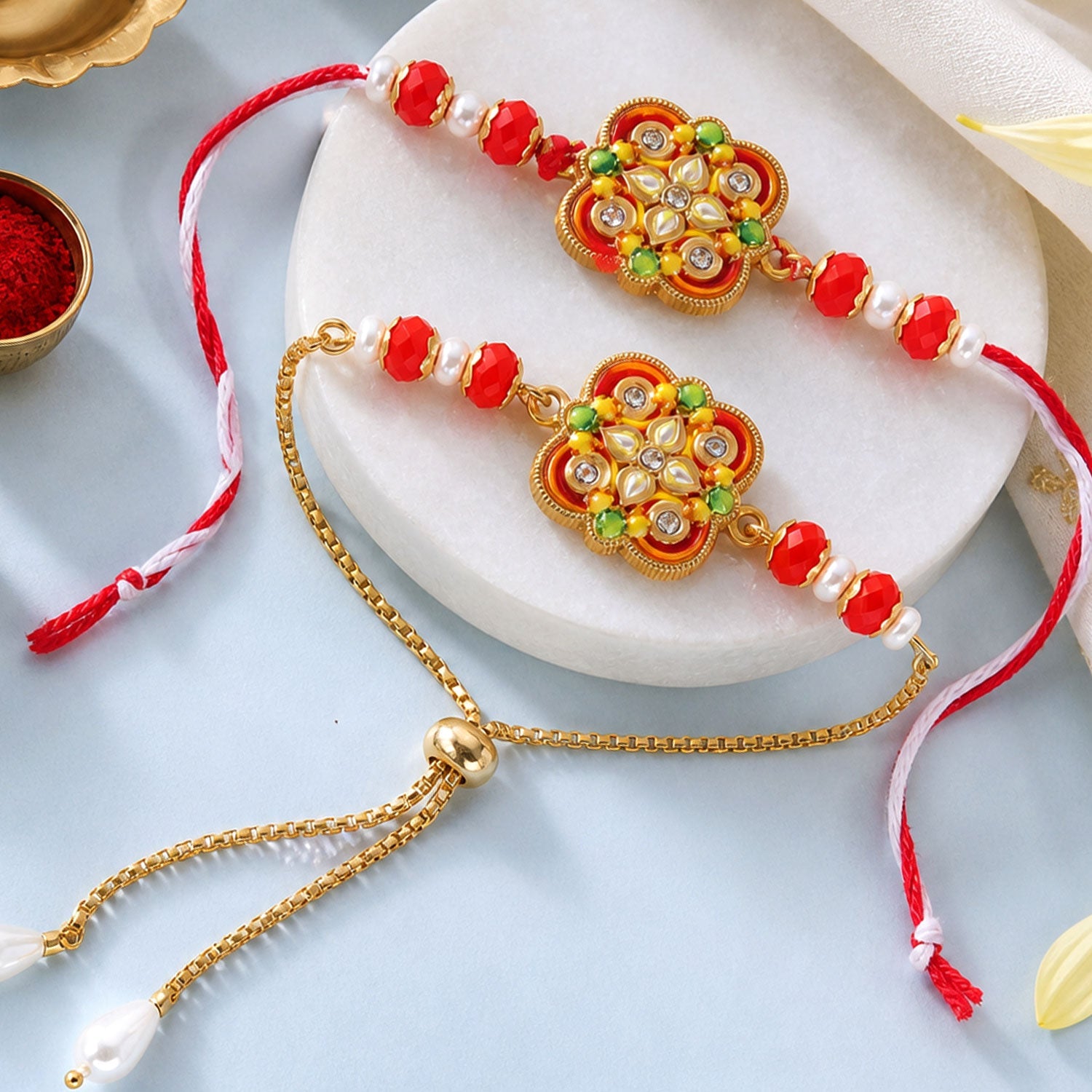 Premium Floral Kundan Bhai Bhabhi Lumba Rakhi with Pearl Accent