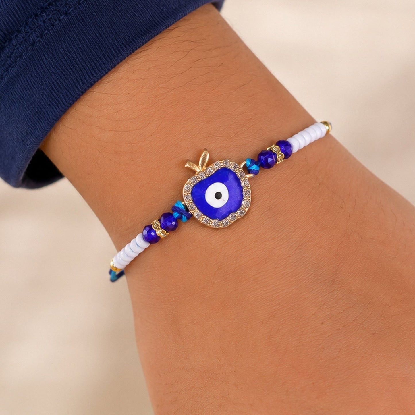 Apple Design Evil Eye Stone Beaded Rakhi with Leaf Crown Center Charm