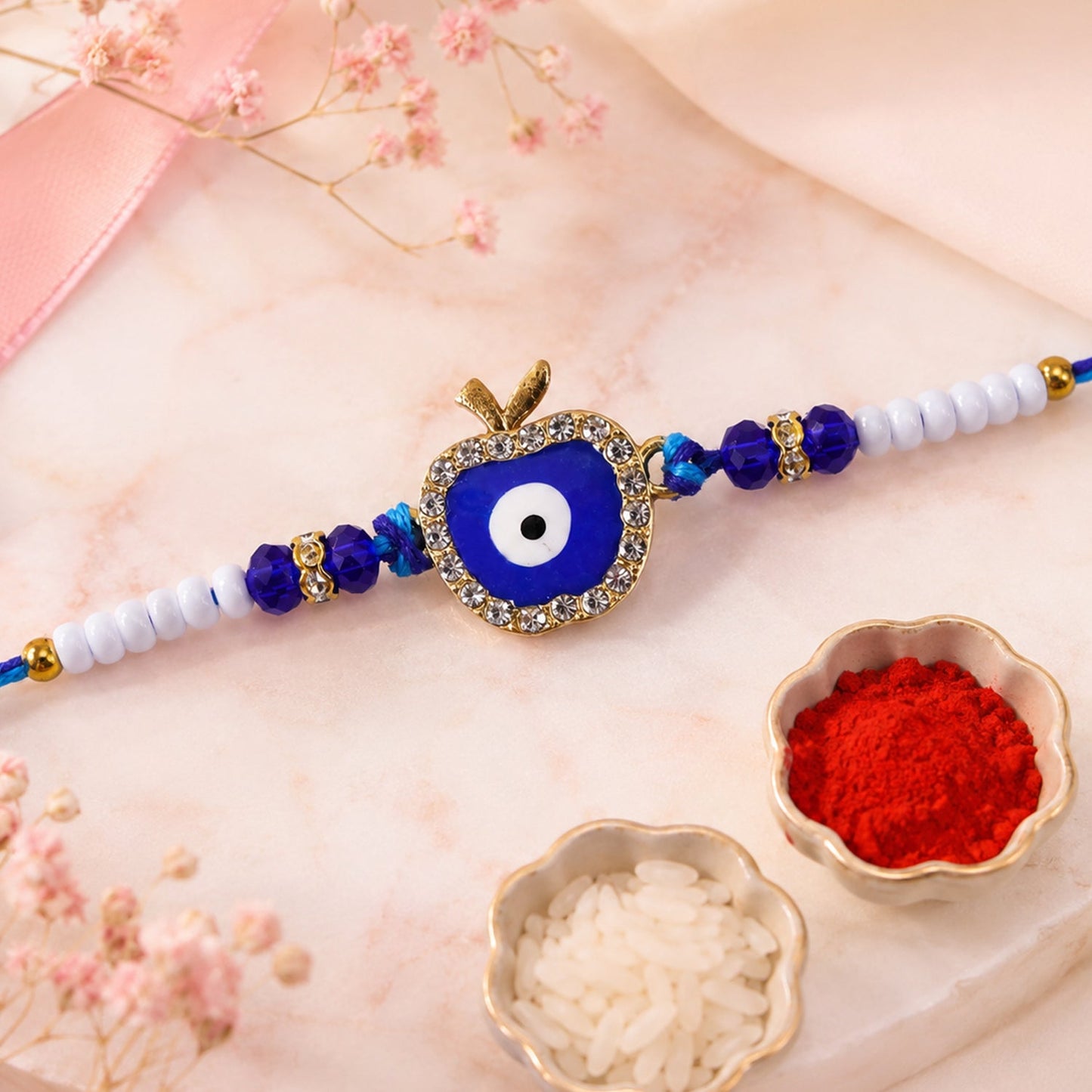 Apple Design Evil Eye Stone Beaded Rakhi with Leaf Crown Center Charm