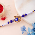 Crown Evil Eye Crystal Beaded Rakhi with Ornate Round Center Charm