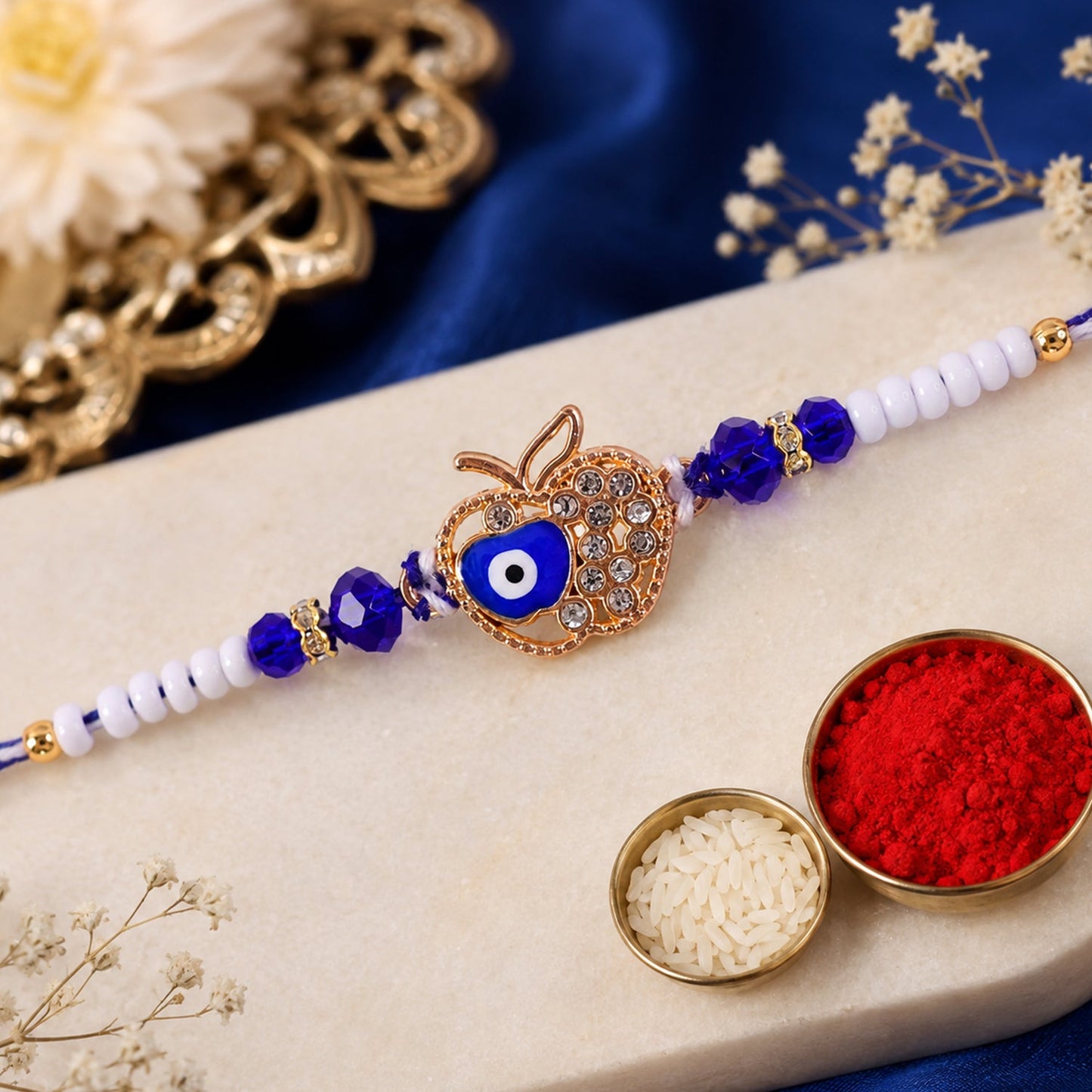 Crown Evil Eye Crystal Beaded Rakhi with Ornate Round Center Charm