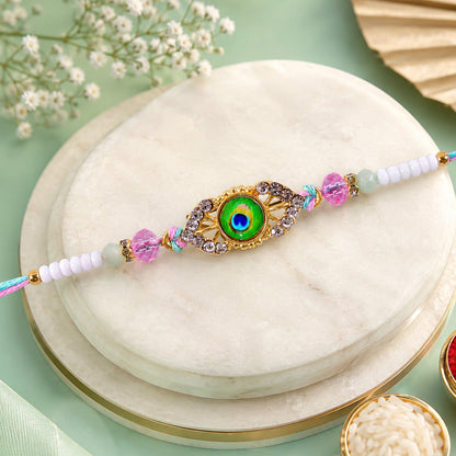 Peacock Feather Kundan Beaded Rakhi with Floral Center Charm Design