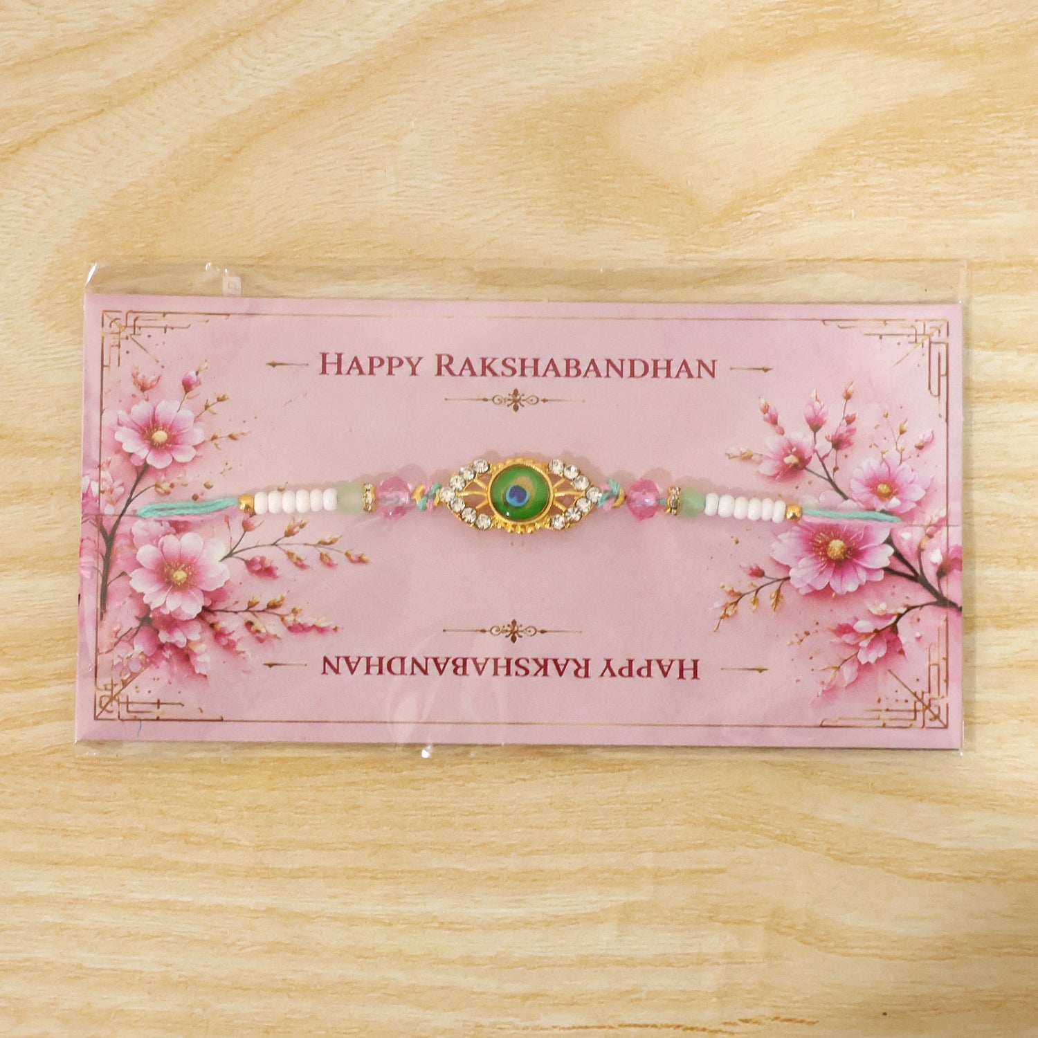 Peacock Feather Kundan Beaded Rakhi with Floral Center Charm Design