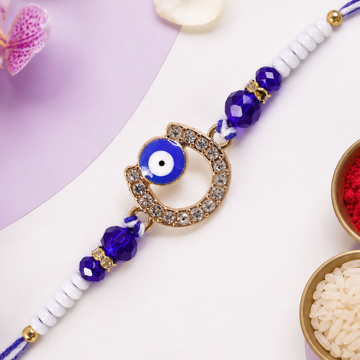 Crescent Evil Eye Beaded Rakhi with Crystal Ring Center Charm