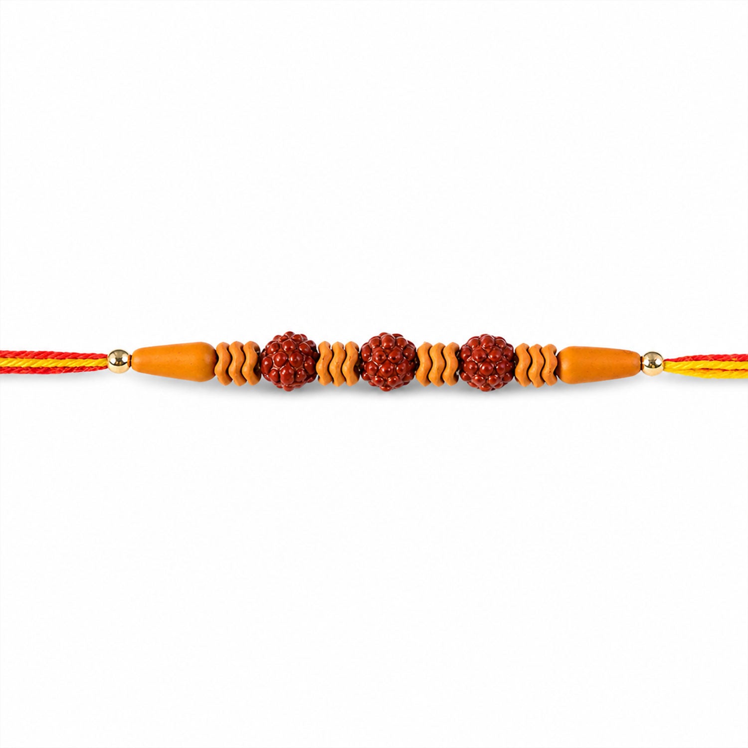 A Rudraksha Rakhi with three textured brown beads and wavy light brown spacers on a red and yellow thread, centered