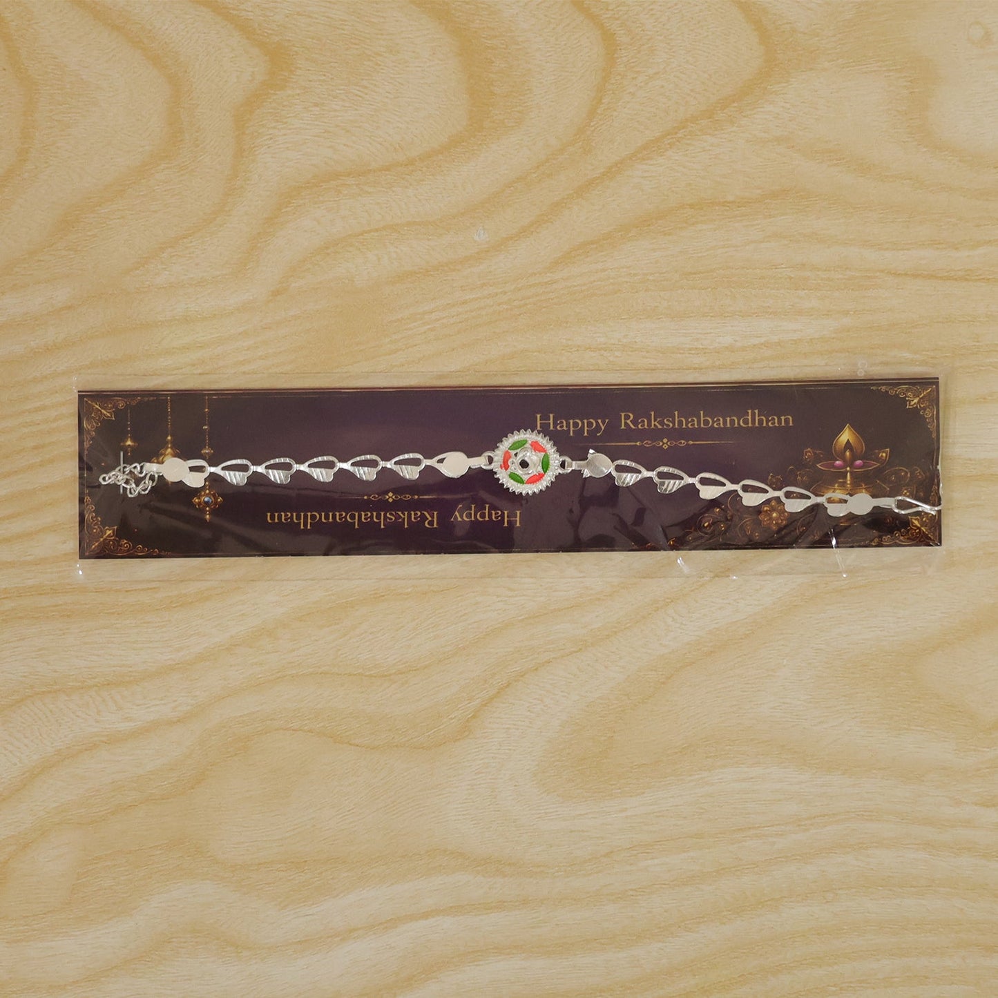 Round Sacred Symbol Silver Chain Rakhi with Stone Studded Center Charm