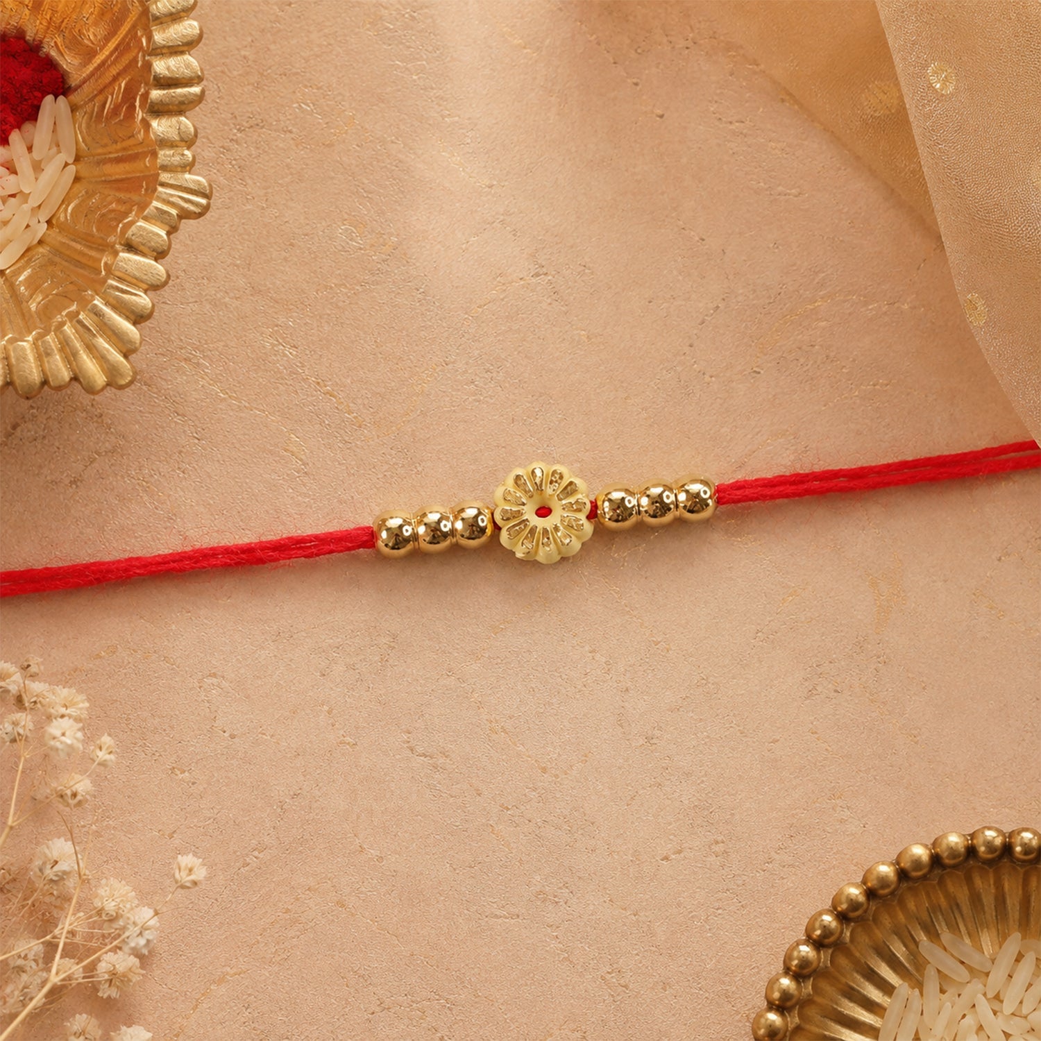 Traditional Floral Motif Golden Bead Minimalist Rakhi