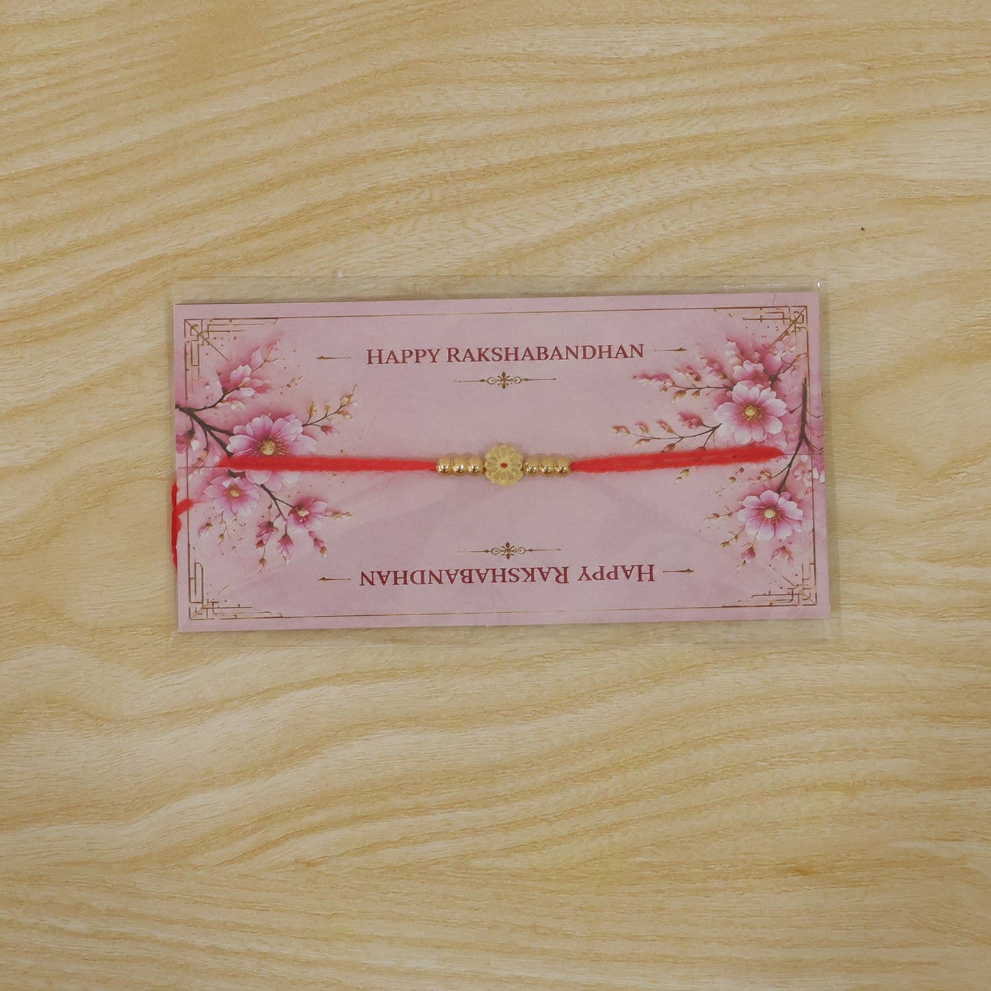 Traditional Floral Motif Golden Bead Minimalist Rakhi