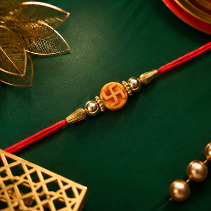Religious Swastik Round Golden Bead Traditional Rakhi