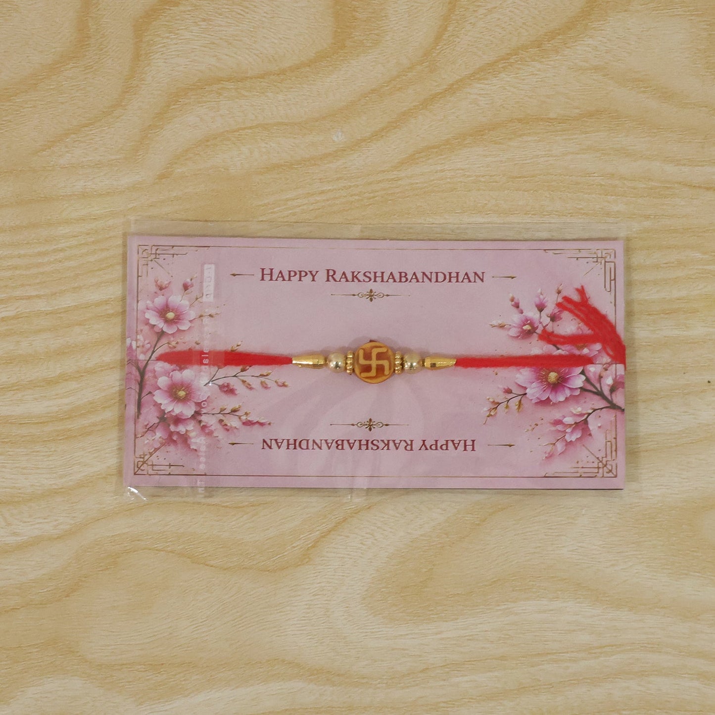 Religious Swastik Round Golden Bead Traditional Rakhi
