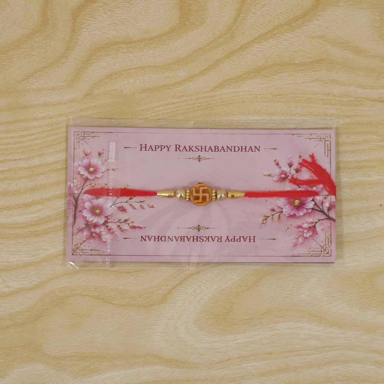 Religious Swastik Round Golden Bead Traditional Rakhi