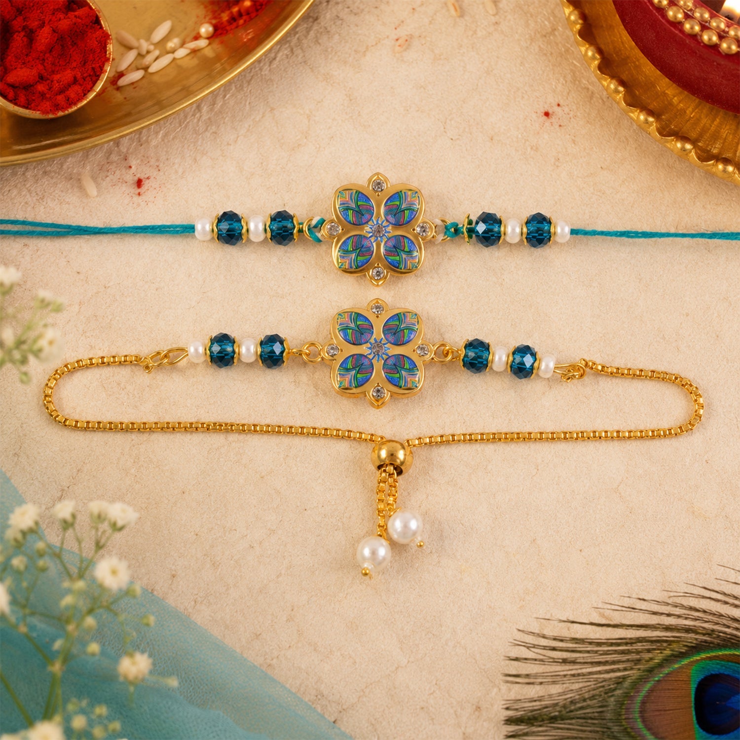 golden plated peacock inspired floral enamel crystal and pearl Bhaiya Bhabhi rakhi set