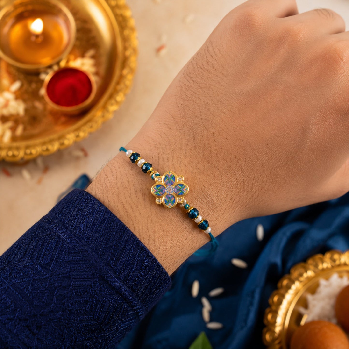 golden plated peacock inspired floral enamel crystal and pearl Bhaiya Bhabhi rakhi set