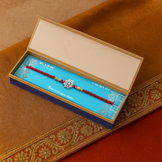 925 Silver Rakhi with Intricate Snowflake-Inspired Floral Design on Red Braided Thread – Premium Single Designer Rakhi