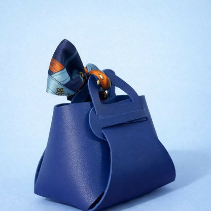Top view of blue handbag organizer showing inside storage