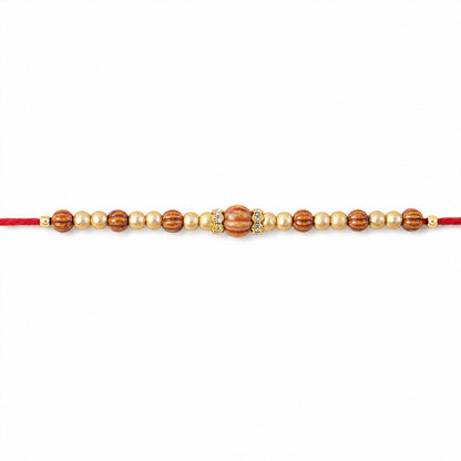 Red Thread Rakhi with Wooden Bead Pendant and Golden Bead Accents