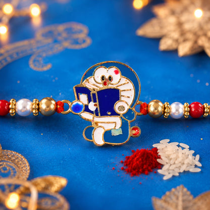 Doraemon Kids Rakhi with Red Gold Beads and Playful Blue Charm