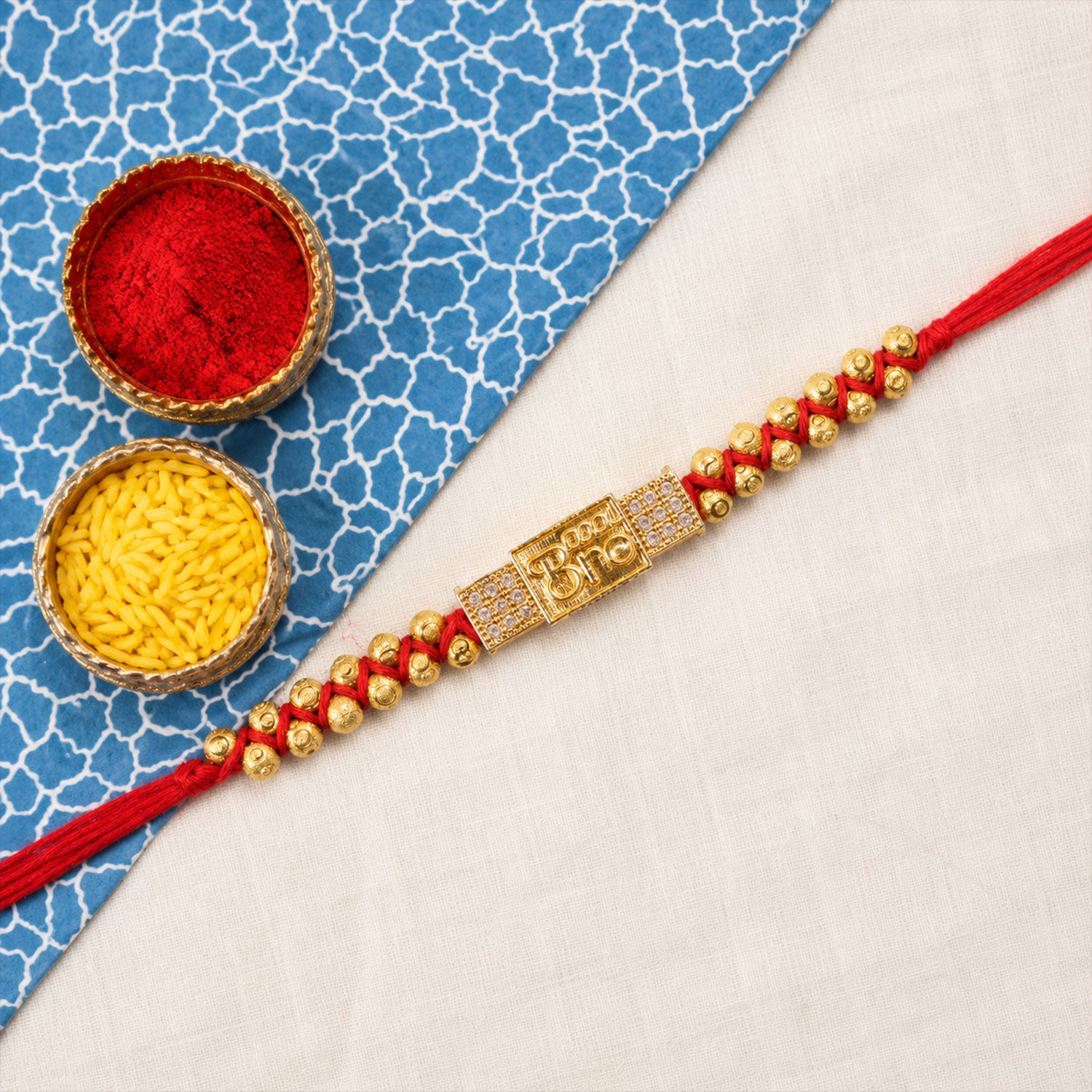 Stylish Brother Nameplate AD Stone Designer Rakhi with Gold Beads Gift