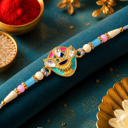 Crown Shaped Kundan Pendant Rakhi with Pink and Teal Enamel