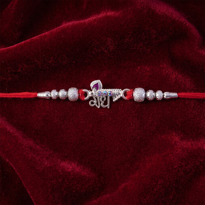 Elegant Radhe Silver Rakhi with Decorative Beads and Red Thread